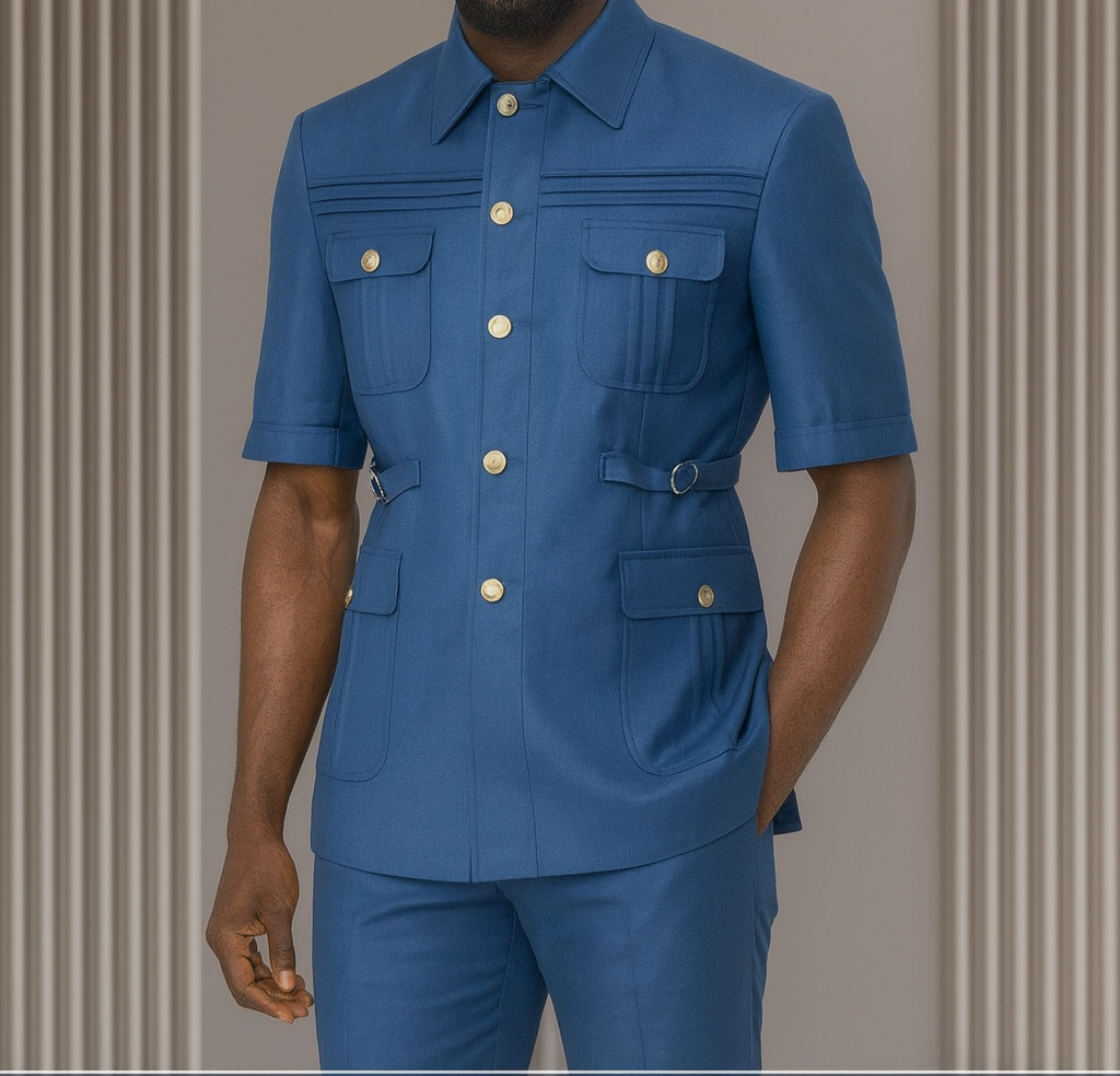Man wearing a blue outfit with gold buttons against a neutral background