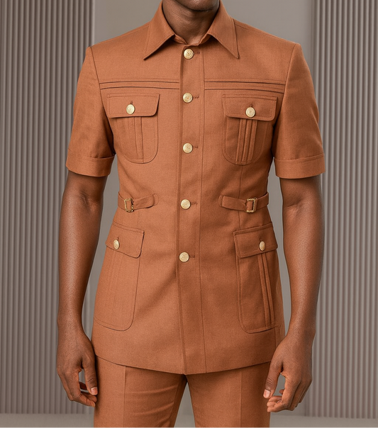 Man wearing a brown outfit with a textured wall background