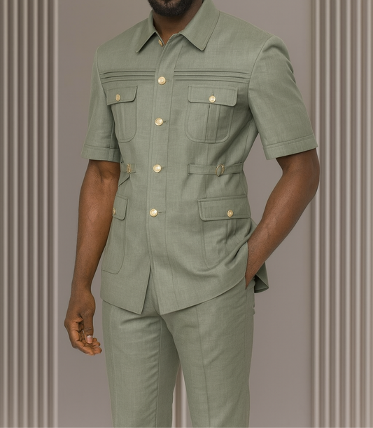 Man wearing a green outfit with a brand logo on a striped background